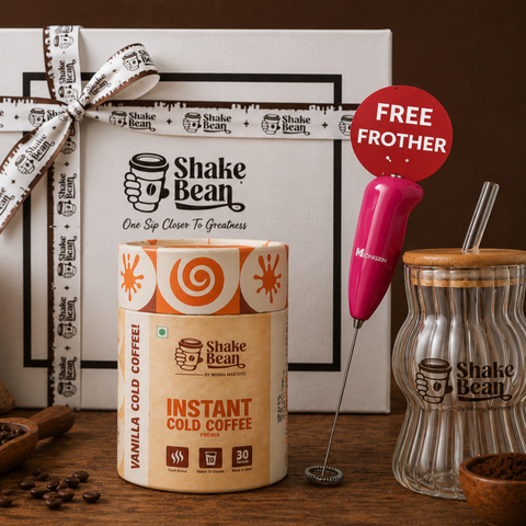 Shake Bean coffee products with a free Frother on a wooden surface